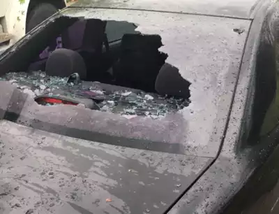 Hailstone damage to car window