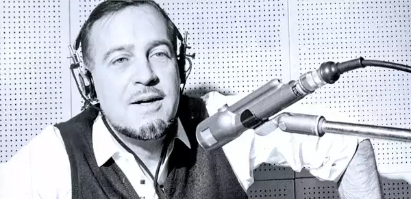 Jean Shepherd at microphone in studio